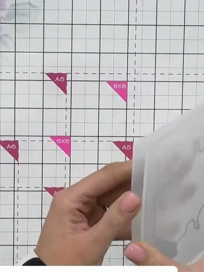 Step 1: Place your cardstock inside the embossing folder with the die positioned where you want the aperture. Run it t