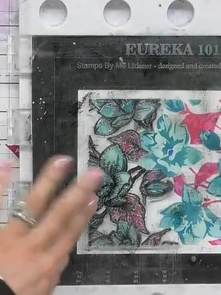 Step 4: Stamp the first half of the separated stamp onto your coloured background using hybrid ink. Line up the stamp 