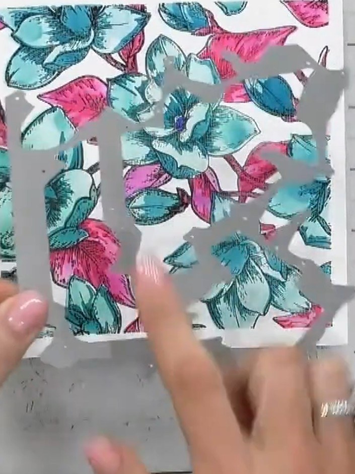 Step 6: Place your decorative cardstock into the aperture die, ensuring it is lined up correctly within the embossing 