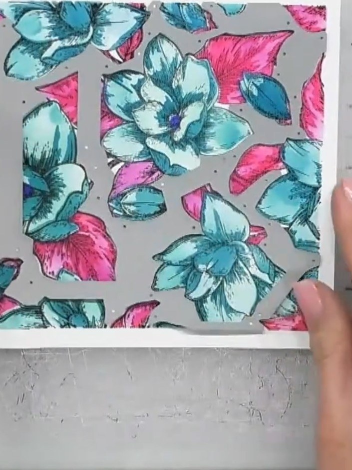 Step 7: Run the layered floral design through your die-cutting machine with the appropriate cutting plates to cut out 